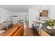 Inviting living room with hardwood floors, stylish seating, and seamless flow to the kitchen at 5369 S Sherman St, Littleton, CO 80121