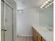 Bathroom with modern shower, vanity, and neutral finishes at 6280 Quay St, Arvada, CO 80003