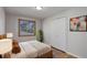 Cozy bedroom featuring a window, closet, and neutral tones at 6280 Quay St, Arvada, CO 80003