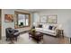 Bright living room with natural light, neutral decor, and stylish furnishings at 6280 Quay St, Arvada, CO 80003