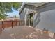Inviting wooden deck with slider to home provides outdoor space for entertaining and enjoying the backyard at 1972 S Carr St, Lakewood, CO 80227