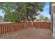 Inviting wooden deck with railing provides outdoor space for relaxation and enjoying the backyard at 1972 S Carr St, Lakewood, CO 80227