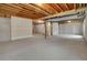 Unfinished basement space with exposed ceiling, concrete floors, and potential for customization at 1972 S Carr St, Lakewood, CO 80227