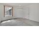 Bright bedroom with plush carpeting, large window, and ample closet space for comfortable living at 1972 S Carr St, Lakewood, CO 80227