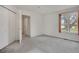 Bright bedroom with plush carpeting, natural light, and ample closet space for comfortable living at 1972 S Carr St, Lakewood, CO 80227