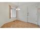 Bright dining area featuring a light fixture, hardwood floors, and a large door at 1972 S Carr St, Lakewood, CO 80227