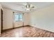 Bright bedroom with wood floors and natural light at 18981 E Mercer Dr, Aurora, CO 80013