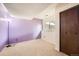 Purple bedroom with carpet and lamp at 18981 E Mercer Dr, Aurora, CO 80013