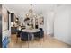 Modern dining space featuring stylish lighting, sleek design, and an open layout into other rooms at 3709 Tejon St, Denver, CO 80211