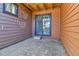 Private patio with sliding glass door, provides seamless indoor-outdoor living at 9501 W 89Th Cir, Broomfield, CO 80021