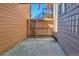 Private patio area enclosed by wooden fence for outdoor enjoyment at 9501 W 89Th Cir, Broomfield, CO 80021
