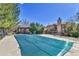 Community pool with cover surrounded by greenery, offering a refreshing amenity for residents to enjoy at 9501 W 89Th Cir, Broomfield, CO 80021