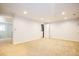 Expansive basement area with neutral carpeting, ready for customization at 2523 E Geddes Ave, Centennial, CO 80122