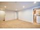 Finished basement offering versatile space and access to a laundry area at 2523 E Geddes Ave, Centennial, CO 80122