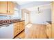 Bright kitchen with sleek countertops, stainless steel appliances, and a convenient pass-through to the dining area at 2523 E Geddes Ave, Centennial, CO 80122