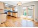 Spacious kitchen and dining area with stainless appliances, access to backyard patio, and plenty of natural light at 2523 E Geddes Ave, Centennial, CO 80122