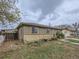 Exterior view of the home with a modest front yard and partial fencing at 5481 Xanadu St, Denver, CO 80239