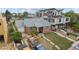 Features a well-maintained lawn and a classic brick facade with modern accents at 1425 Xavier St, Denver, CO 80204