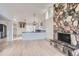 Updated kitchen with black countertops and cabinets at 34 S Raleigh St, Denver, CO 80219