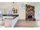 Modern kitchen with white cabinets and granite countertops at 34 S Raleigh St, Denver, CO 80219