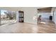 The sunny living area features hardwood floors and natural light at 34 S Raleigh St, Denver, CO 80219