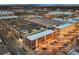 An aerial view of the brick building nestled in a vibrant urban neighborhood at 7110 W Alaska Dr # A, Lakewood, CO 80226