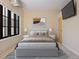 Comfortable bedroom with natural light and stylish decor and furniture at 7110 W Alaska Dr # A, Lakewood, CO 80226