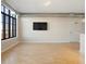 Open living area with hardwood floors and exposed ductwork at 7110 W Alaska Dr # A, Lakewood, CO 80226