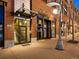 A street-level view of a commercial building at 7110 Belmar with glass storefronts at 7110 W Alaska Dr # A, Lakewood, CO 80226