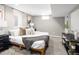 Cozy bedroom featuring plush bedding, neutral decor, and ample natural light for a relaxing retreat at 1290 S Elizabeth St, Denver, CO 80210