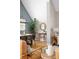 Bright dining area with hardwood floors, stylish decor, and ample natural light at 1290 S Elizabeth St, Denver, CO 80210
