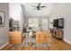 Inviting living room with hardwood floors, vaulted ceilings, and stylish leather chairs at 1290 S Elizabeth St, Denver, CO 80210