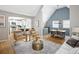 Open concept living room flows into a modern kitchen and elegant dining area at 1290 S Elizabeth St, Denver, CO 80210