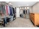 Spacious walk-in closet with custom shelving and ample storage for clothes and accessories at 1290 S Elizabeth St, Denver, CO 80210
