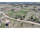 Aerial view displays the community, surrounding landscape, neighboring homes, and the property location at 2166 Appaloosa Trl, Elizabeth, CO 80107