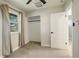 Bedroom featuring an open closet, window, and white painted walls at 2166 Appaloosa Trl, Elizabeth, CO 80107