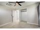 Neutral bedroom with carpeting, a closet, and white trim at 2166 Appaloosa Trl, Elizabeth, CO 80107