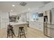 Bright kitchen with stainless steel appliances, large island, and ample counter space for cooking and entertaining at 2166 Appaloosa Trl, Elizabeth, CO 80107