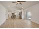 Open floor plan featuring a living room, dining room, and kitchen with stainless steel appliances at 2166 Appaloosa Trl, Elizabeth, CO 80107