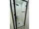 A shower showcasing white tile, a black showerhead, and a built-in niche at 528 S Youngfield Ct, Denver, CO 80228