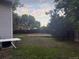 Backyard features a flat grassy area and partial fencing at 3220 W 133Rd Cir, Broomfield, CO 80020