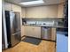 Spacious kitchen with stainless steel appliances and lots of cabinets for storage at 3220 W 133Rd Cir, Broomfield, CO 80020