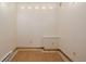 A bedroom featuring wood look flooring and natural light, providing a relaxing and comfortable space at 3581 Gap Rd, Golden, CO 80403