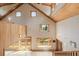 Living room with lots of natural light and access to the deck at 3581 Gap Rd, Golden, CO 80403