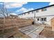 Small backyard with patio and wood fence at 4336 Decatur St, Denver, CO 80211