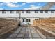 Private backyard with patio and raised garden beds at 4336 Decatur St, Denver, CO 80211