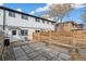 Private backyard with patio and raised garden beds at 4336 Decatur St, Denver, CO 80211