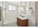 Clean bathroom with subway tile and modern vanity at 4336 Decatur St, Denver, CO 80211