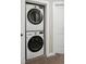 Laundry closet with stackable LG washer and dryer at 4336 Decatur St, Denver, CO 80211