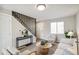 Living area with modern staircase and comfortable seating at 4336 Decatur St, Denver, CO 80211